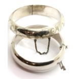 Two sterling silver bangles, largest D: 7 cm, combined weight 50g. P&P Group 1 (£14+VAT for the