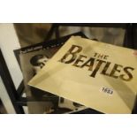 Beatles 20 greatest hits and two Paul McCartney albums. P&P Group 2 (£18+VAT for the first lot