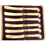 Set of six silver handled butter knives with pistol grips. P&P Group 1 (£14+VAT for the first lot