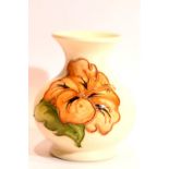 Small Moorcroft baluster vase in the cream Hibiscus pattern, H: 9.5 cm. P&P Group 1 (£14+VAT for the