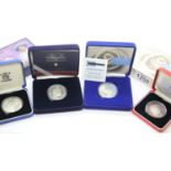 Four boxed silver crowns. P&P Group 1 (£14+VAT for the first lot and £1+VAT for subsequent lots)