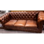 Brown leather button back Chesterfield style three seater sofa. Not available for in-house P&P.