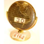 1960s brass rotating calendar, H: 11 cm. P&P Group 1 (£14+VAT for the first lot and £4+VAT for