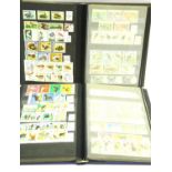 Two thematic stamp albums, Cats, Dogs, Horses and Birds. P&P Group 2 (£18+VAT for the first lot
