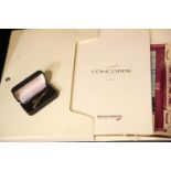 Folder of Concorde ephemera including photographs, menu, flight certificate and boxed Concorde pin