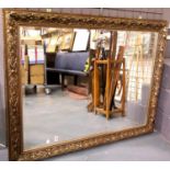 Very large bevelled edge gilt framed mirror, 110 x 140 cm. Not available for in-house P&P.