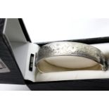 Sterling silver bangle, boxed, L: 7 cm, 33g. P&P Group 1 (£14+VAT for the first lot and £1+VAT for