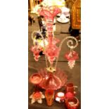 Edwardian Cranberry Glass epergne with baskets and fluted vases and five small pieces of Cranberry