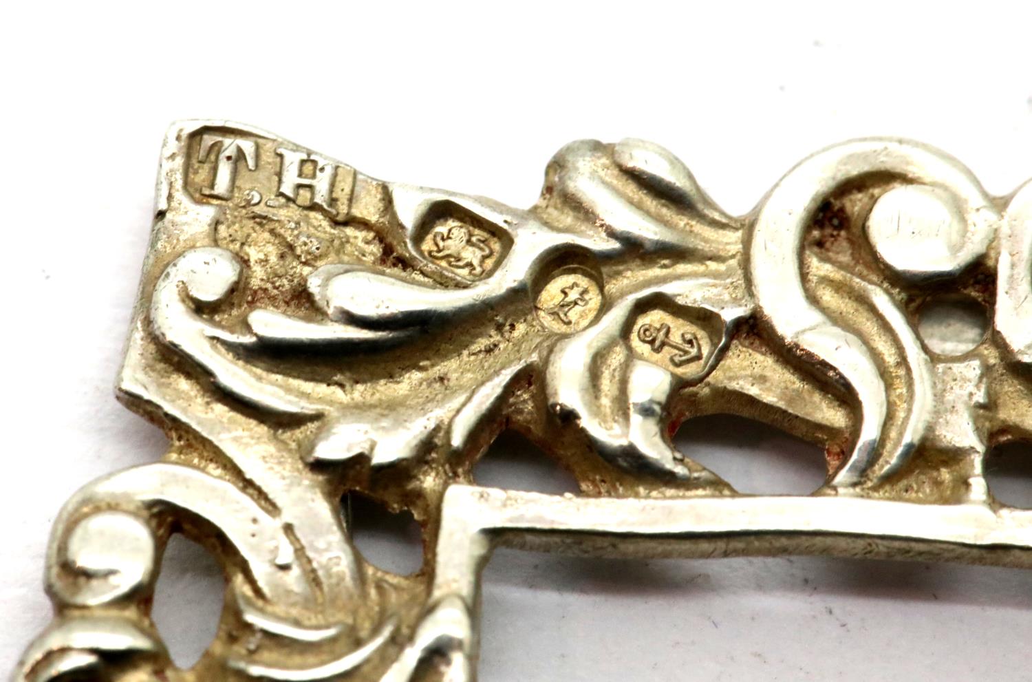 Victorian hallmarked silver relief designed buckle with three tangs, Birmingham assay 1893, 36g. P&P - Image 2 of 4