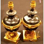 Pair of early 20th century gilt and enamelled baluster table lamps on square plinth bases, H: 30 cm.