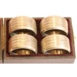 Four boxed hallmarked silver napkin rings, 74g. P&P Group 1 (£14+VAT for the first lot and £1+VAT