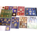 Mixed UK coin sets with other coins and notes. P&P Group 1 (£14+VAT for the first lot and £1+VAT for