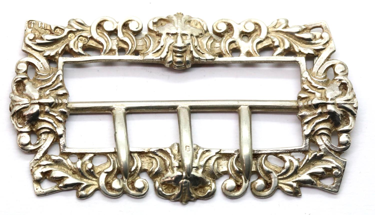 Victorian hallmarked silver relief designed buckle with three tangs, Birmingham assay 1893, 36g. P&P