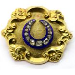 Victorian mourning brooch, tested as 15-18ct gold, with enamelled horseshoe set with array of