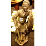 Carved marble figurine of a African warrior, H: 48 cm. Not available for in-house P&P.