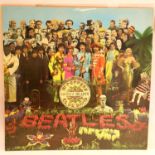 Beatles Sgt Pepper Lonely Hearts Club Band in good condition with posters. P&P Group 1 (£14+VAT