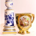 Vienna porcelain decorated gilt cup and a single Meissen candlestick. P&P Group 2 (£18+VAT for the