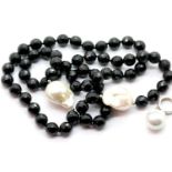 Baroque pearl and glass necklace and a single Baroque pearl earring. P&P Group 1 (£14+VAT for the