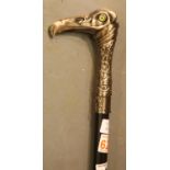Eagles head walking stick with green eyes, L: 94 cm. P&P Group 3 (£25+VAT for the first lot and £5+