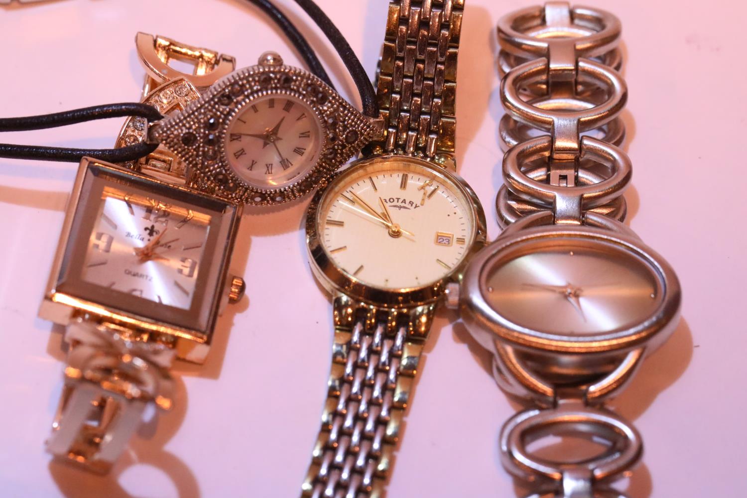 Four ladies fashion wristwatches including Rotary. P&P Group 1 (£14+VAT for the first lot and £1+VAT