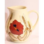 Moorcroft jug in the Harvest Poppy pattern, H: 15 cm. P&P Group 2 (£18+VAT for the first lot and £