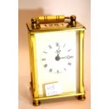 Brass Dominion carriage clock with visual escapement. P&P Group 2 (£18+VAT for the first lot and £