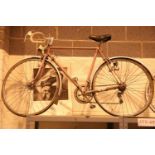 Gents Raleigh racing bike with 12 gears and a 22 inch frame. Not available for in-house P&P