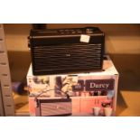 Black GPO Darcy a portable analogue FM / AM radio with alarm clock. Preset 20 radio stations.