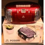 Red, 3-in-1 FM/AM Radio, CD and Cassette player, boxed. GPO PCD299. In working order. Not