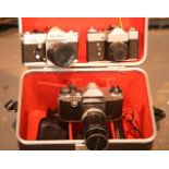 3 vintage film cameras, including Zenit, Petri & Praktica with 35mm, 50mm & 135mm lenses and