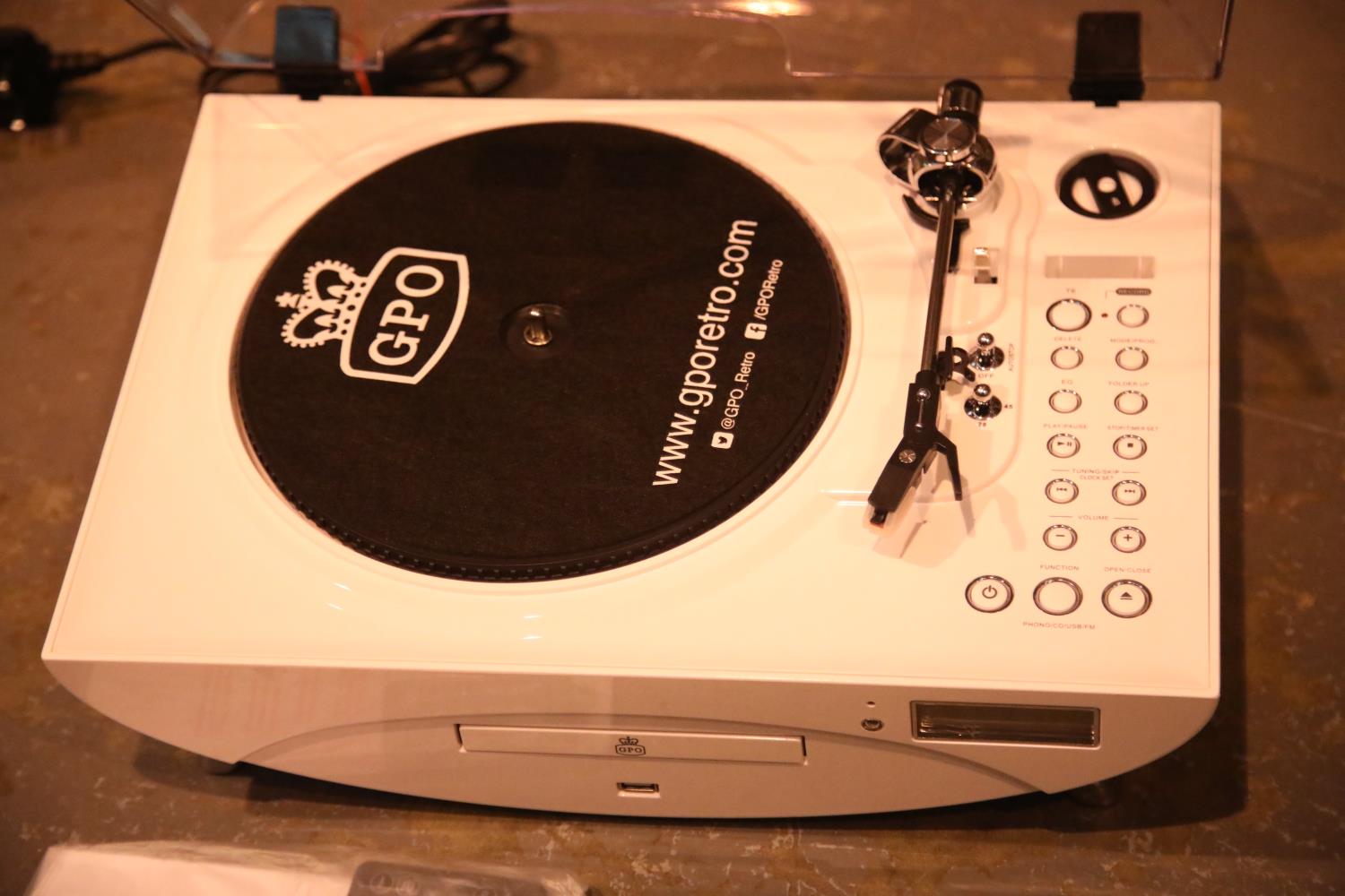 White, Jive Music Centre ? 3 speed turntable: 33/45/78; CD/ MP3/ USB player; FM radio & remote