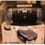 Black, 3-in-1 FM/AM Radio, CD and Cassette player, boxed. GPO PCD299 In working order. Not available