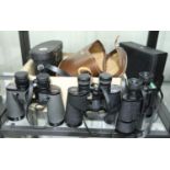 Four pairs of Swift binoculars including Audubon model all in good working order. P&P Group 2 (£18+