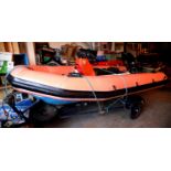 12ft Rigid Inflatable Boat. 25 HP Mercury 2 stroke engine- electric start. Roller trailer with