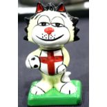 Lorna Bailey football cat, H: 13 cm. P&P Group 1 (£14+VAT for the first lot and £1+VAT for