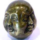 Brass four faced Buddha head with impressed seal to base, H: 6 cm. P&P Group 1 (£14+VAT for the