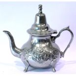 Two Arabic white metal teapots, each inscribed to base. P&P Group 3 (£25+VAT for the first lot