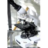 Binocular microscope, by Kyowa Optical, model Unilux, with four lenses. P&P Group 3 (£25+VAT for the