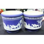 Adam's Tunstall, a near pair of Jasperware style relief decorated planters in white over blue,