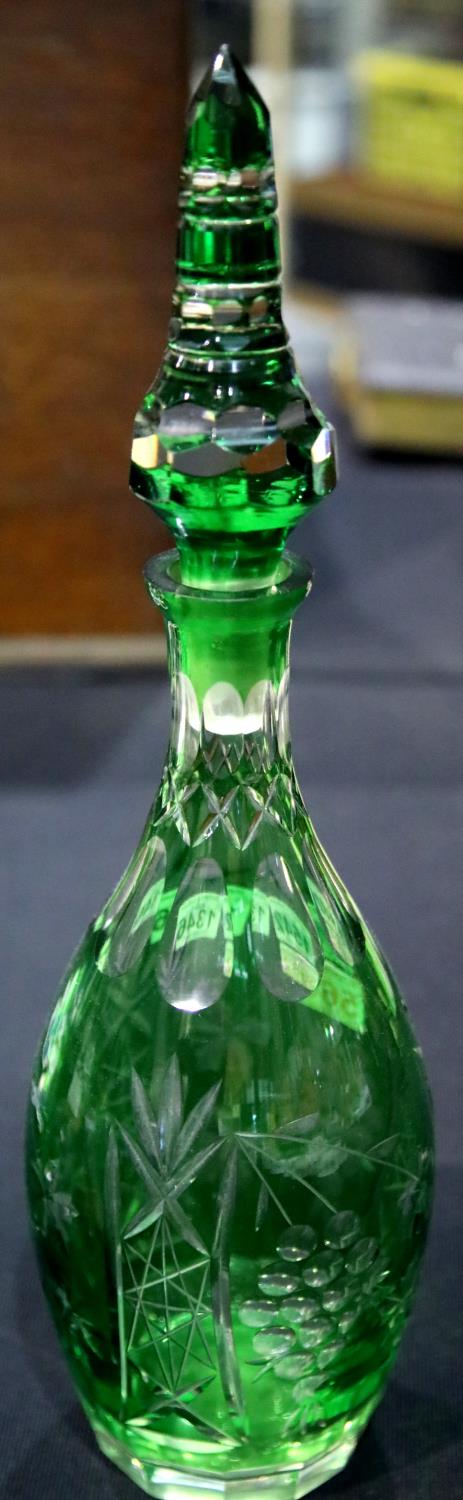 Bohemian crystal decanter in green, H: 45 cm. P&P Group 3 (£25+VAT for the first lot and £5+VAT