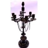 19th Century bronze Egyptian Revival six-sconce candelabra with central plug, raised on a marble