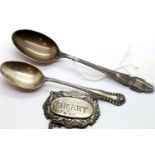 Two hallmarked silver teaspoons and a hallmarked silver sherry decanter label, total weight 60g,