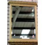 Gilt framed bevelled edge mirror, overall 92 x 64 cm. Not available for in-house P&P