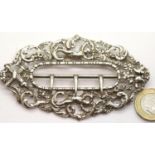 Large hallmarked silver nursing buckle, L: 10 cm, 55g. P&P Group 1 (£14+VAT for the first lot and £