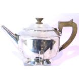 George VI Art Deco hallmarked silver teapot with bakelite handle and finial, Sheffield 1935, 620g.