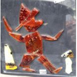 Mid-century style panel with applied slag glass in the form of a gnome, 43 x 43 cm, unsigned. Not