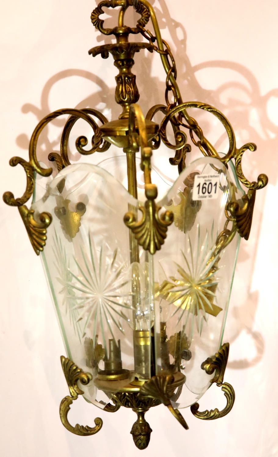 Early 20th century brass and cut glass porch lantern, one panel damaged, length of drop: 47 cm