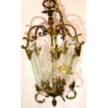 Early 20th century brass and cut glass porch lantern, one panel damaged, length of drop: 47 cm