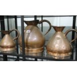 Copper 1 gallon copper flagon stamped GR 1932, two gallon stamped ER 56 and a half gallon flagon.