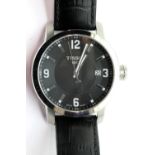 Gents Tissot 1853 calendar wristwatch with black dial. P&P Group 1 (£14+VAT for the first lot and £